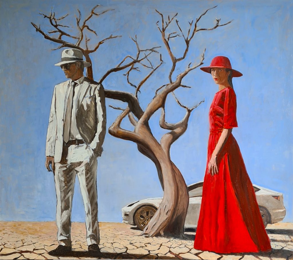 Desert. A barren tree and a Tesla car. A woman in a red dress and a man in a white suit and Panama hat. 