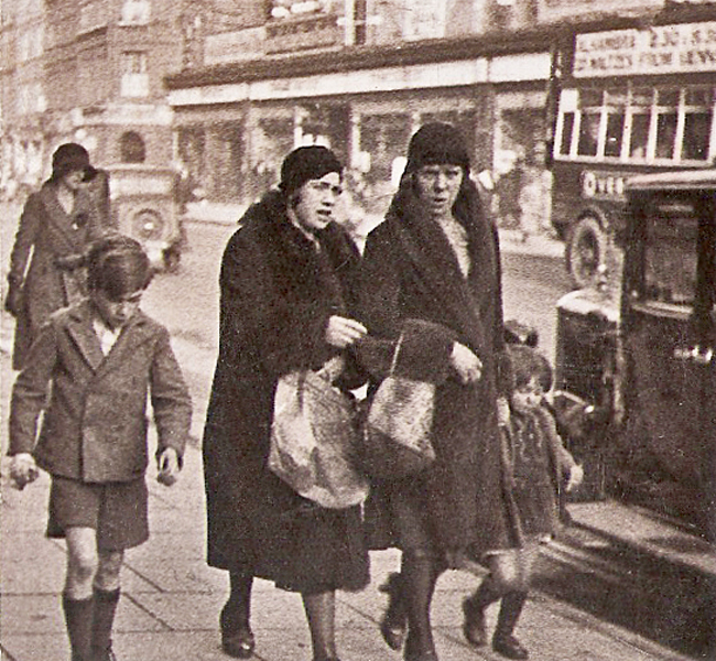 two women and their children in Camden High Street 1928